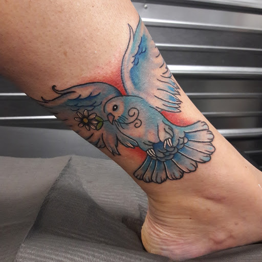 Explore tattoo word cover up ideas, creative tattoo ideas in Utica, available at Beyond The Chair Tattoo Studio - Shelby Township