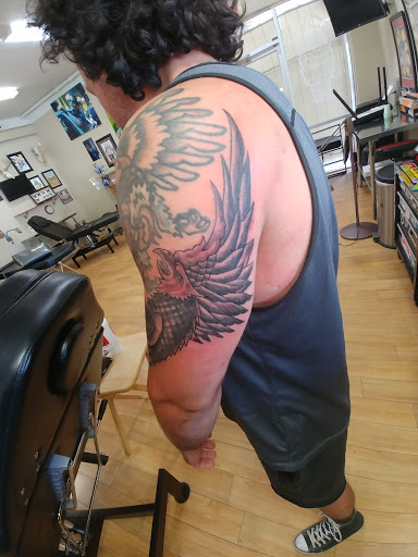 Find dali tattoo ideas for your next unique tattoo in Liberty at Dark Lotus Tattoo & Salon