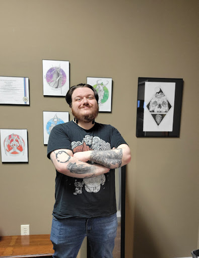 Explore back tattoos ideas guys, creative tattoo ideas in Wisconsin Dells, available at Twisted Dimensions Tattoo Studio