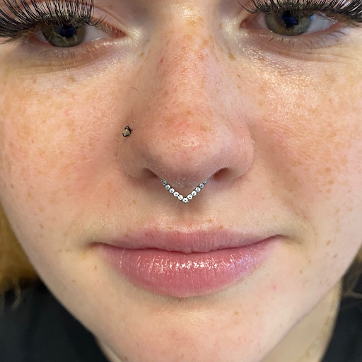 Explore cool hand tattoo ideas, creative tattoo ideas in Lansing, available at Be-You-tiful Body Piercing & Fine Jewelry