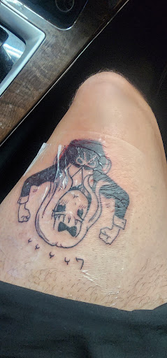 Find fish tattoo ideas for guys for your next unique tattoo in Oak Grove at NeverMore Galleries Tattoo Studio