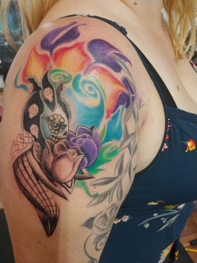 Explore cover up tattoo ideas on ankle, creative tattoo ideas in Davenport, available at Unique Ink Art Studio