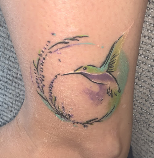 Explore name neck tattoo ideas, creative tattoo ideas in Grand Haven, available at Ink Haven Tattoo Studio