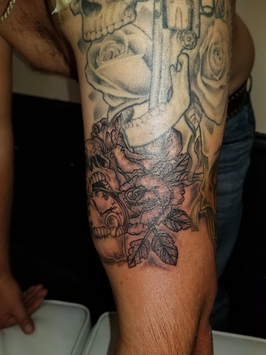 Explore marriage ring tattoo ideas, creative tattoo ideas in Onalaska, available at Divine Designs tattoo studio