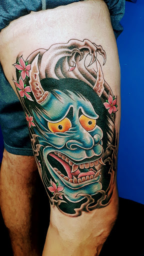 Explore red string tattoo ideas, creative tattoo ideas in Redding, available at DEADLIFT TATTOO