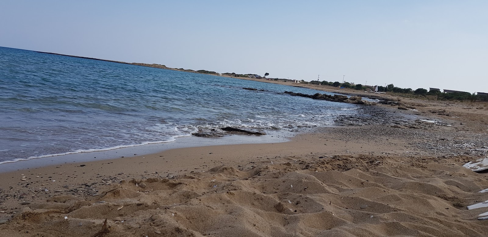 Kocareis beach的照片 带有蓝色的水表面