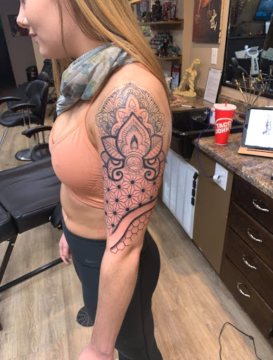 Explore black and white voodoo/ragdoll broken heart tattoo ideas, creative tattoo ideas in Ottumwa, available at Family Tradition TattoosPiercings