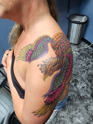 Explore tattoo cross ideas for men, creative tattoo ideas in Yankton, available at Exquisite Ink