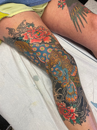 Explore rose vine tattoo ideas, creative tattoo ideas in Oshkosh, available at Easy Street Tattoo