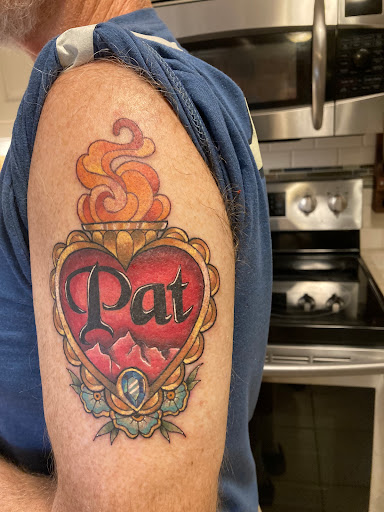 Explore male chest tattoo ideas, creative tattoo ideas in Amherst, available at Apothecary Tattoo