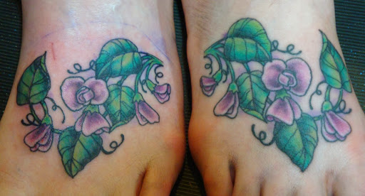 Explore small couples tattoo ideas, creative tattoo ideas in Oshkosh, available at 920 Tattoo Company LLC