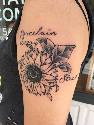 Find skull tattoo ideas for females for your next unique tattoo in Strasburg at Champion Tattoo Company