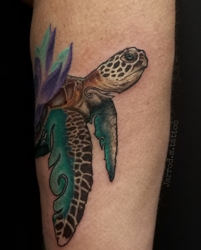 Explore love and war tattoo ideas, creative tattoo ideas in Prairieville, available at Nolana Tattoo & Piercing