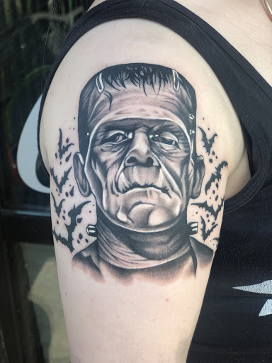 Explore tattoo ideas of lions, creative tattoo ideas in Erie, available at Wayward Tattoo Studio