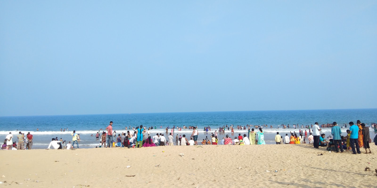 Foto van Ramayapattanam public Beach en de nederzetting