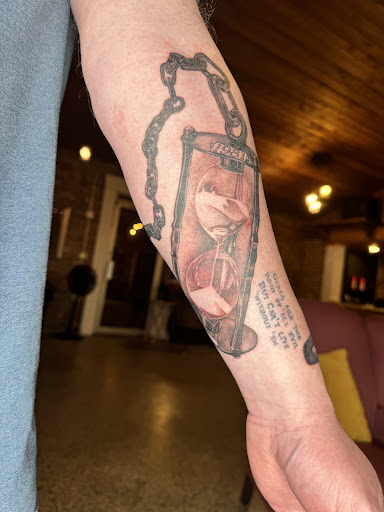 Explore disney sleeve tattoo ideas, creative tattoo ideas in Broxton, available at Seratonin Tattoo Parlor