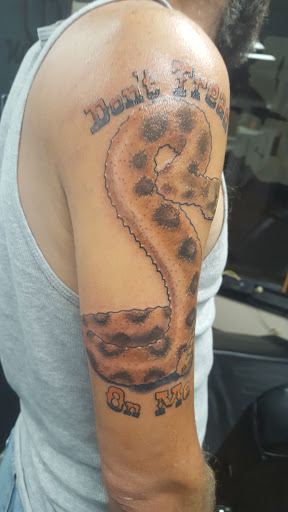 Explore tattoo ideas for back of hand, creative tattoo ideas in Huntington, available at Inkd Revolution