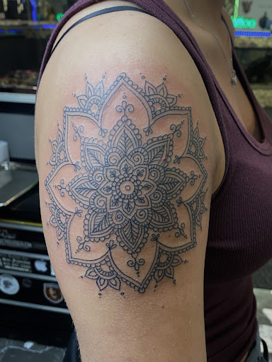 Explore tattoo ideas for the chest, creative tattoo ideas in Kansas City, available at Divine Tattoo Parlor