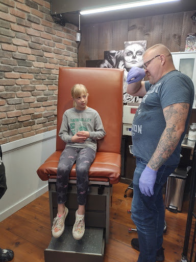 Explore cool upper arm tattoo ideas, creative tattoo ideas in Leesport, available at Kens tattoo and body piercing