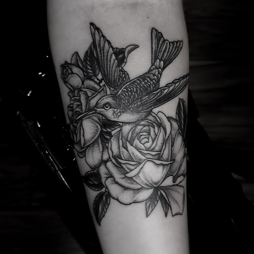 Explore military dog tag tattoo ideas, creative tattoo ideas in Calhoun, available at A Sailors Grave Tattoo Parlor