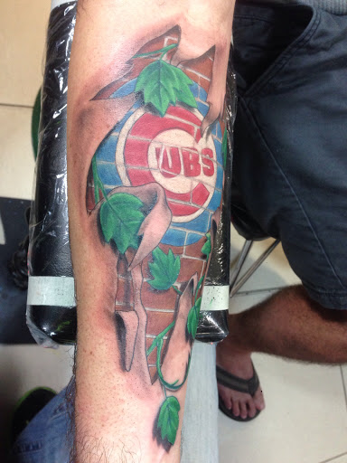 Explore tricep tattoo ideas for guys, creative tattoo ideas in Cape Coral, available at The Tattoo Emporium