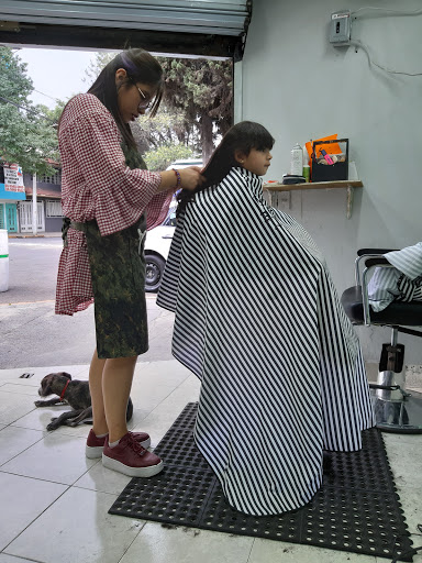 Mubaarak Salón y Barbería