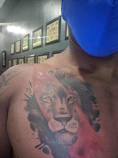 Explore red tattoo ideas, creative tattoo ideas in Pearland, available at Black List Tattoo & Piercing Co.