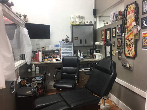 Explore papa bear tattoo ideas, creative tattoo ideas in Broken Arrow, available at Geek Ink Tattoo and Piercings