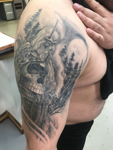 Explore tattoo ideas for grandfather, creative tattoo ideas in Palestine, available at Blood lines Tattoo Studio