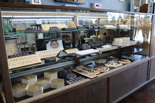 Explore ovarian cancer tattoo ideas, creative tattoo ideas in Kansas City, available at Landlocked Tattoo & Piercing LLC