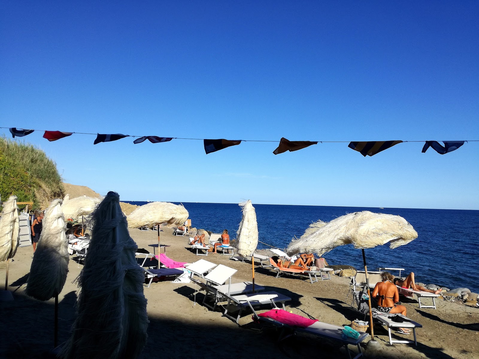 Foto av Caletta del Bagnino med rak strand