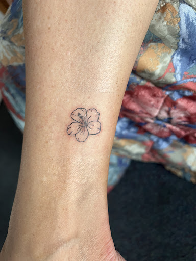 Explore stomach tattoo ideas for women, creative tattoo ideas in Honolulu, available at Black Palette Tattoo & Piercing