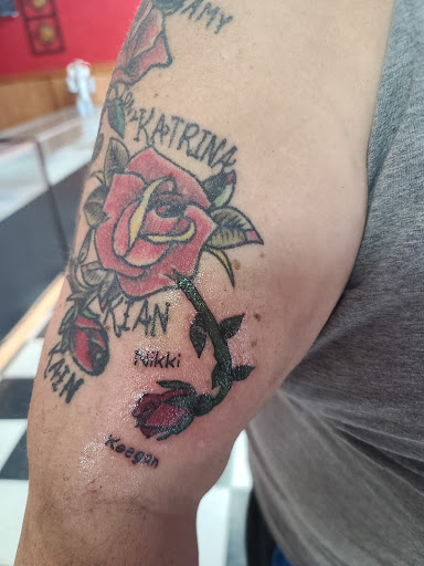 Explore daughter tattoo ideas for men, creative tattoo ideas in Demotte, available at Revelations Tattoo Parlor