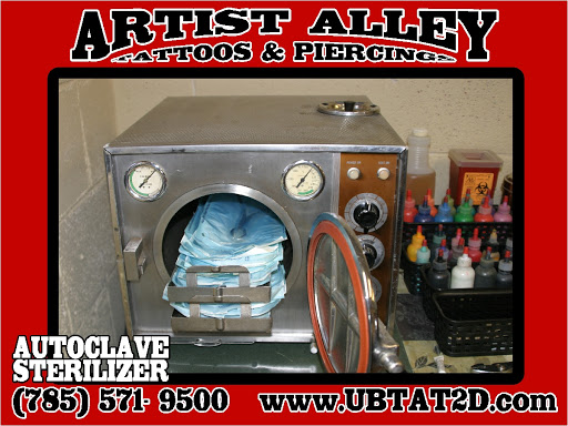 Explore aztec tattoo sleeve ideas, creative tattoo ideas in Topeka, available at Artist Alley Studio Tattoos & Piercings