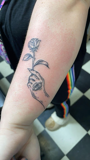 Explore dog paw tattoos ideas, creative tattoo ideas in Medina, available at Art In Motion Inc Tattooing