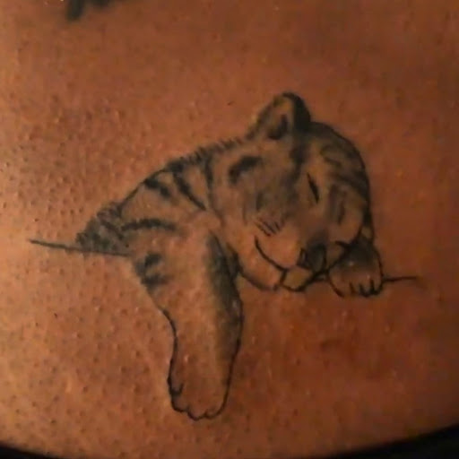 Explore black flower tattoo ideas, creative tattoo ideas in Vancouver, available at Studio X Tattoos & Piercings