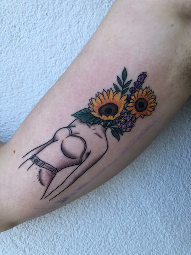 Explore joker hand tattoo ideas, creative tattoo ideas in Saint Petersburg, available at Foolish Pride Tattoo Co.