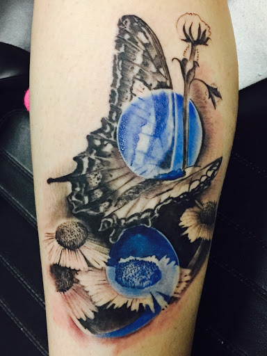 Explore back of the leg tattoo ideas, creative tattoo ideas in Savannah, available at Tatlyfe Studios