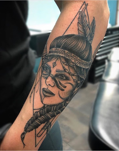 Explore bald head tattoo ideas, creative tattoo ideas in Atlanta, available at Big Cat Tattoo