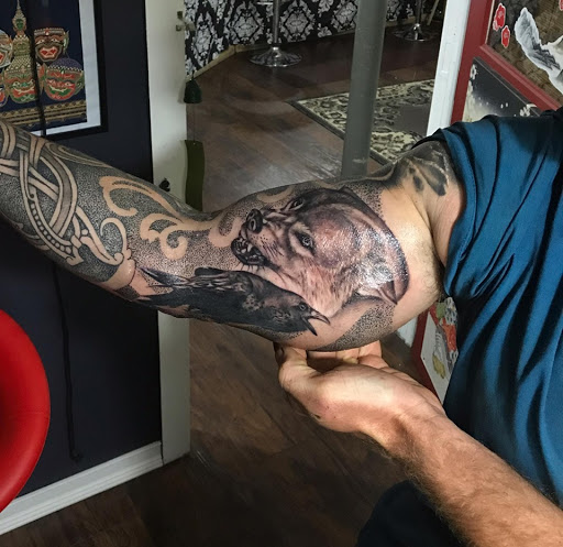 Explore tattoo of child's name ideas, creative tattoo ideas in Kingsford, available at Deft Tattoo Studio