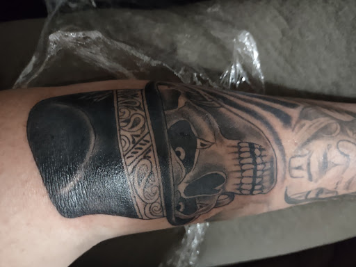 Explore tattoo ideas for a dad, creative tattoo ideas in Dallas, available at Tames Ink MF Tattoo and Piercing