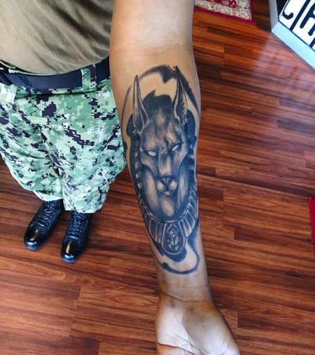 Explore mothman tattoo ideas, creative tattoo ideas in Atlantic Beach, available at The Ink Chamber Tattoo Parlor