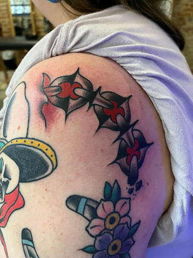 Explore snake tattoo ideas for guys, creative tattoo ideas in Cambridge, available at Choptank Tattoo