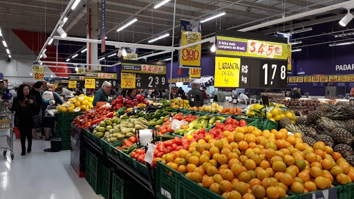 Logo da empresa - Mercado Extra