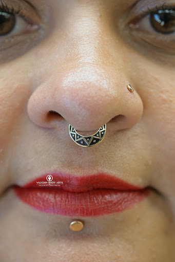 Find tattoo crown ideas for your next unique tattoo in Monterey at Vaughn Body Arts