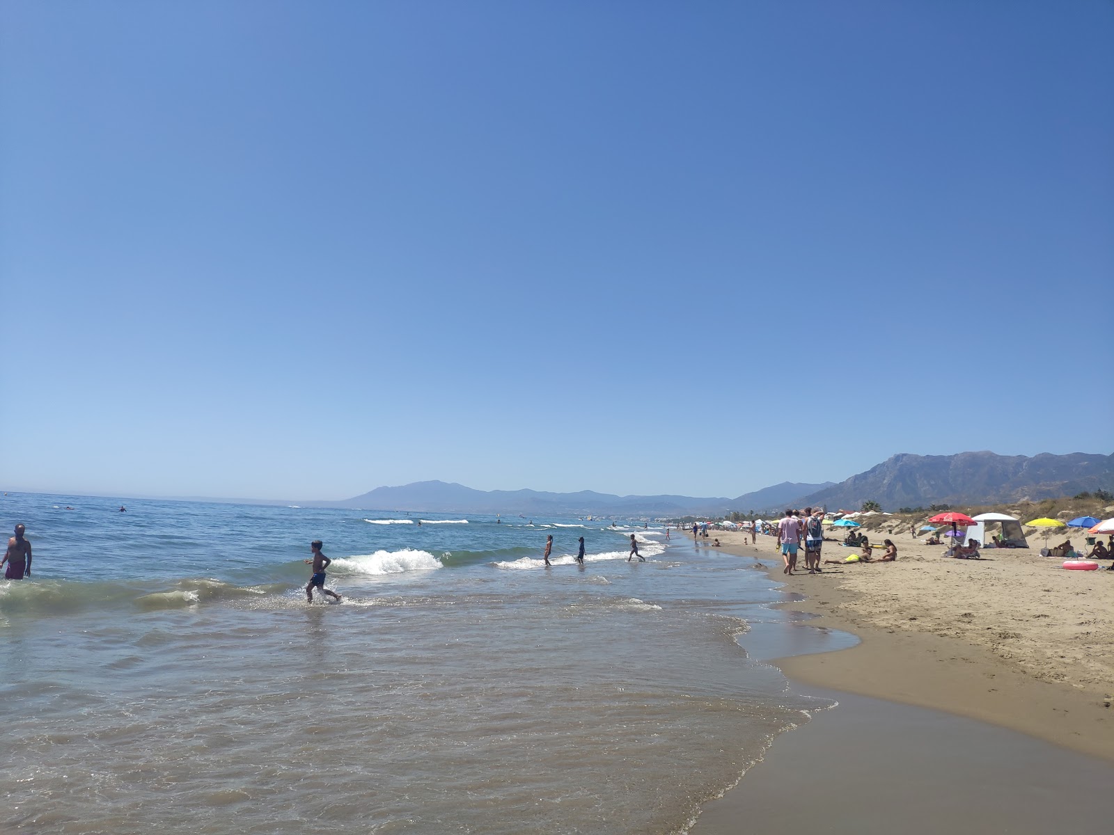 Fotografie cu Playa De Zaragoza cu o suprafață de nisip strălucitor