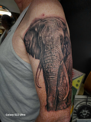 Explore newborn tattoo ideas for dad, creative tattoo ideas in Houston, available at Los Muertos Tattoo Studio and Art Gallery
