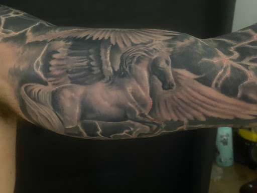 Explore godsmack tattoo ideas, creative tattoo ideas in Sarasota, available at SEVEN SINS Tattoo Studio