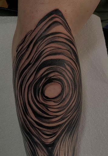 Explore watercolor flower tattoo ideas, creative tattoo ideas in Lake Villa, available at Eternal Tiger Tattoo