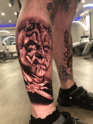 Explore gundam tattoo ideas, creative tattoo ideas in Norcross, available at JP Alfonso Studios